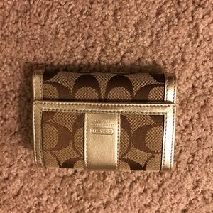 SOLD Coach compact trifold wallet